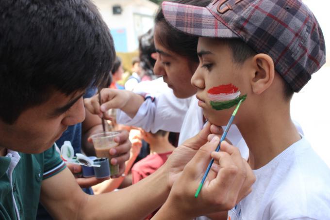 Face art during the charity event in Dushanbe